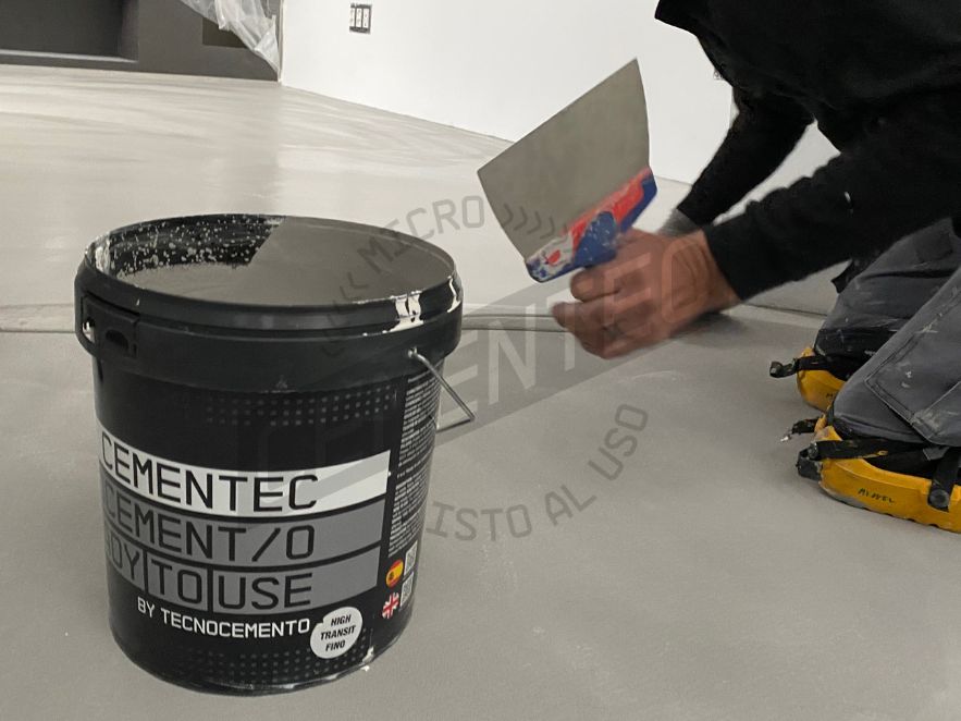 cementec product cube to explain the difference between microcement and polished concrete