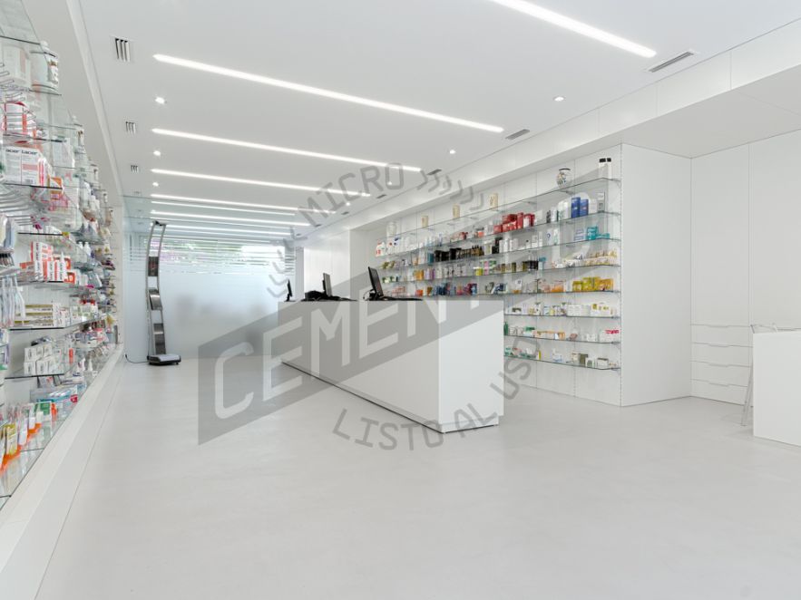 Refurbishment carried out in a pharmacy where the properties of Cementec microcement can be seen.