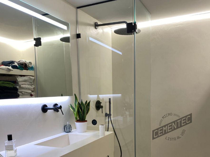 Ready-to-use Cementec microcement walls in a bathroom.