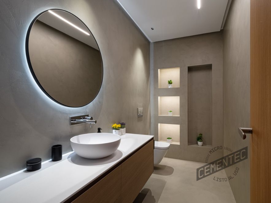 Final result of the bathroom in a beach flat renovated and applied with Cementec microcement.