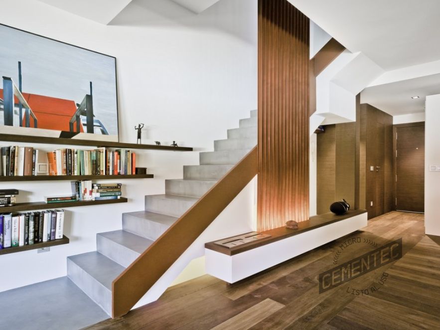 Ready-to-use Cementec microcement stairs with wooden parquet flooring.
