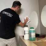 Microcement applicator explaining how to clean microcement with Cementec products.