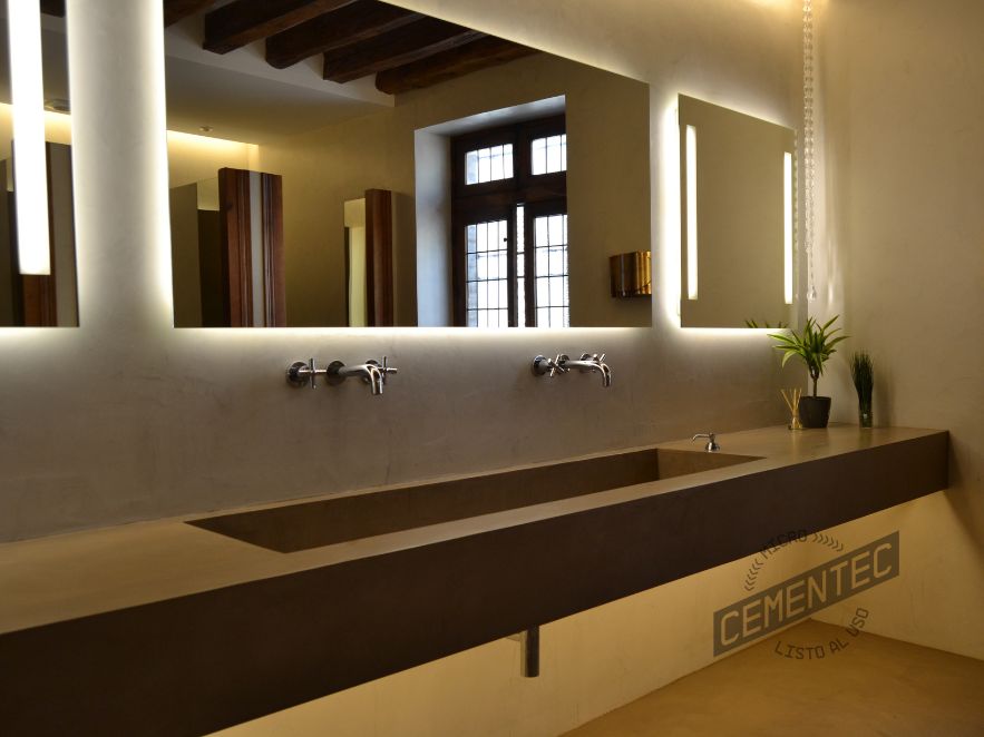 Application of microcement in commercial premises washbasins with Cementec.
