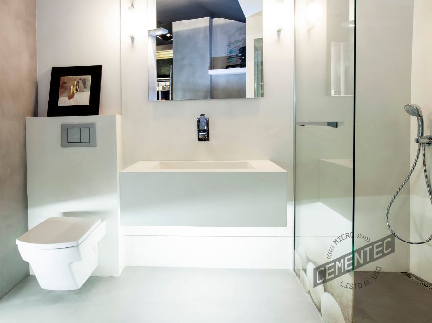 White microcement bathroom combined with pearl grey by Cementec.