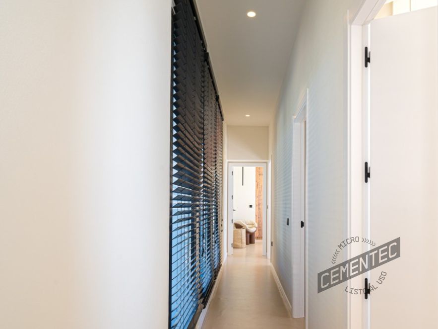 Hallway with colour in Cementec microcement floor.