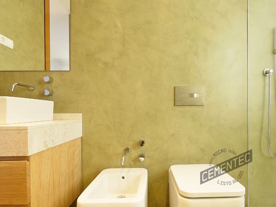 Bathroom with texture of microcement wall finishes.