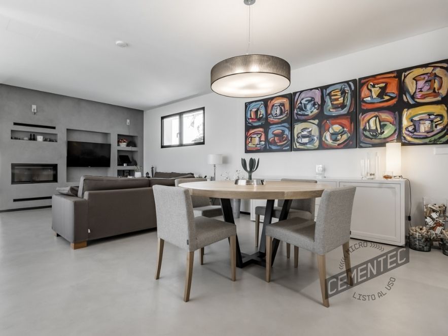 Dining room clad with Cementec grey microcement.