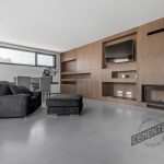 Renovation of underfloor heating with Cementec ready-to-use microcement in living room.