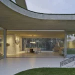 Garden floors without construction with microcement in interior and exterior renovation project.